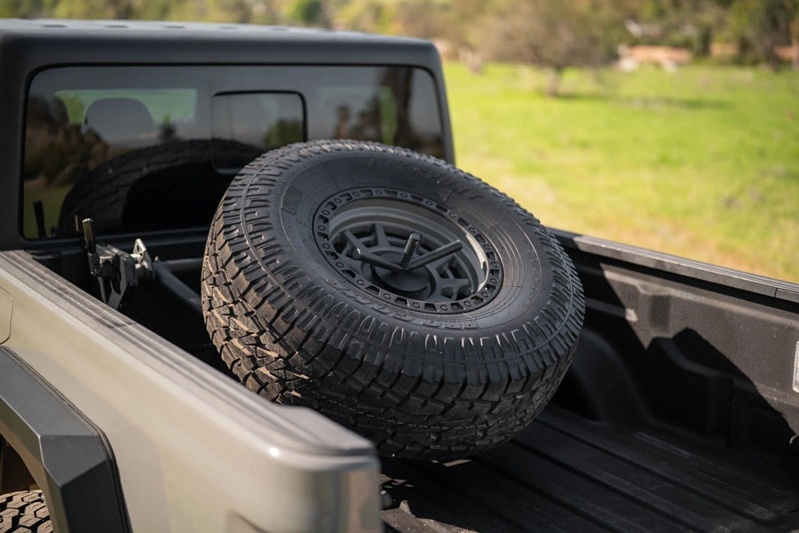 DV8 Offroad Adjustable In-Bed Tire Carrier