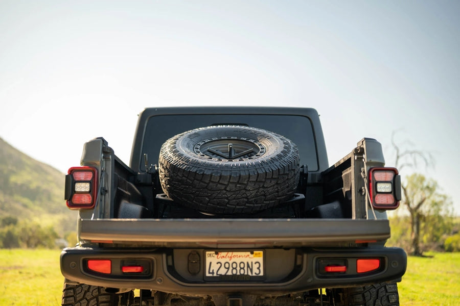 DV8 Offroad Adjustable In-Bed Tire Carrier